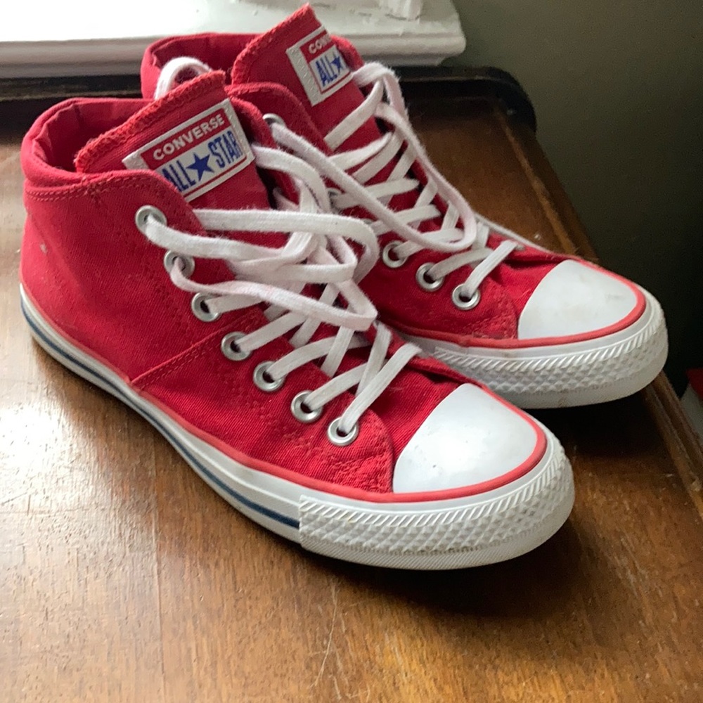 Red converse high top shoes
